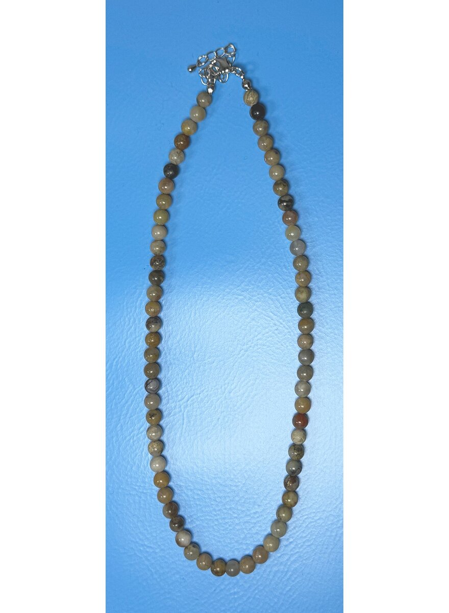 Auf diesem Bild sehen Sie das Produktbild 1 fr HALSKETTE VERSTEINERTER SAURIERCOPROLIT-KUGELN IN BOX